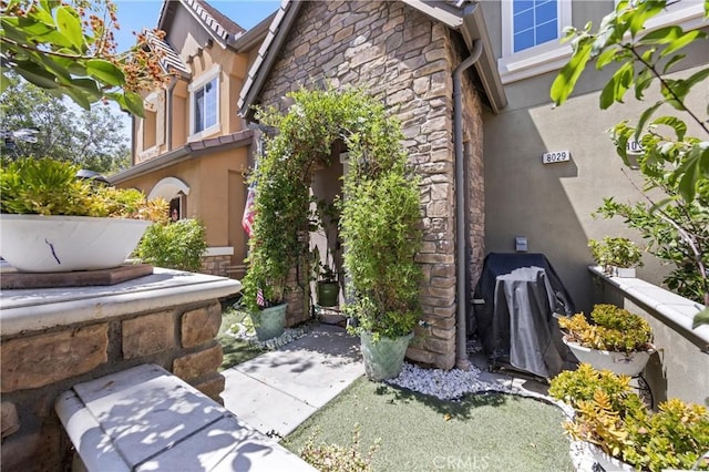 8029 Spencer St, Chino, CA 91708 - view of side of property featuring stone siding and stucco siding