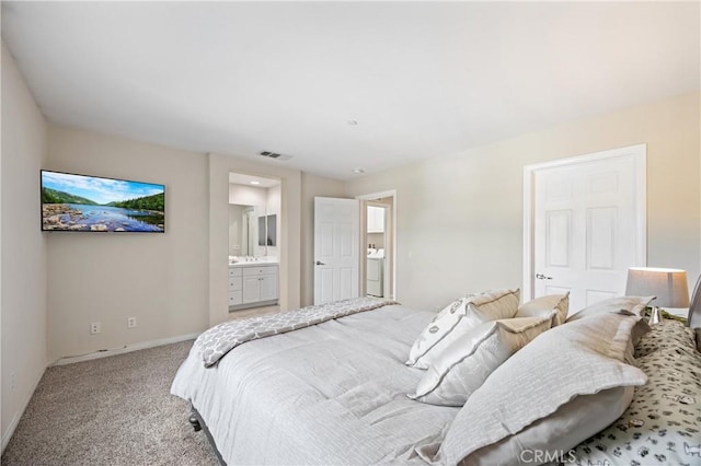 8029 Spencer St, Chino, CA 91708 - bedroom featuring carpet flooring, baseboards, ensuite bathroom, and washer / dryer