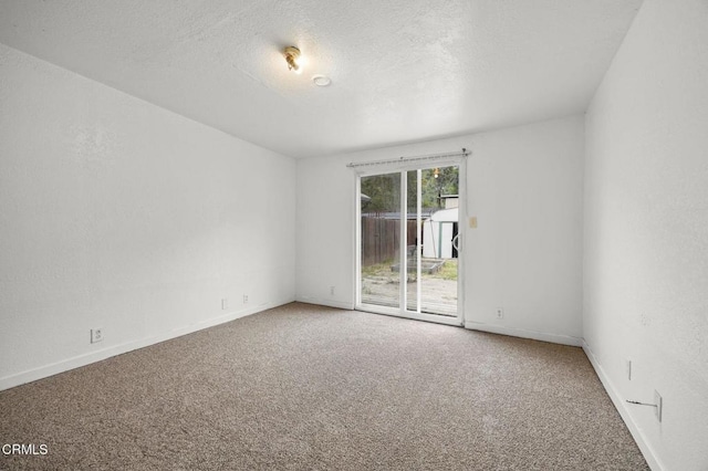 8590 N Ventura Ave, Ventura, CA 93001 - carpeted empty room with baseboards