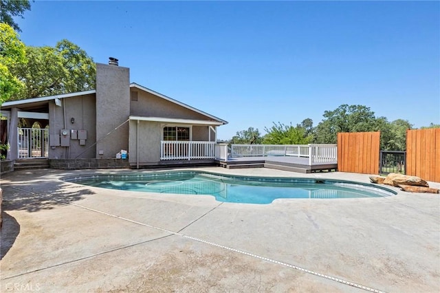 2681 Pinecrest Rd, Oroville, CA 95966 - view of swimming pool with a wooden deck, a patio area, and fence