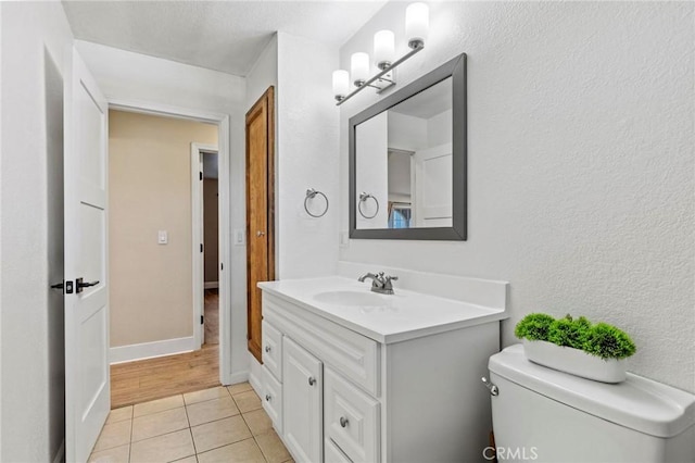 2681 Pinecrest Rd, Oroville, CA 95966 - bathroom with vanity, tile patterned flooring, and toilet