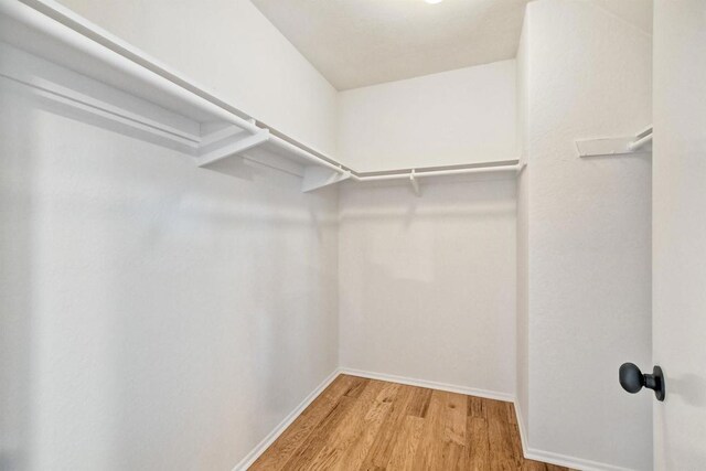 13063 Caminito Del Rocio, Del Mar, CA 92014 - spacious closet with wood finished floors