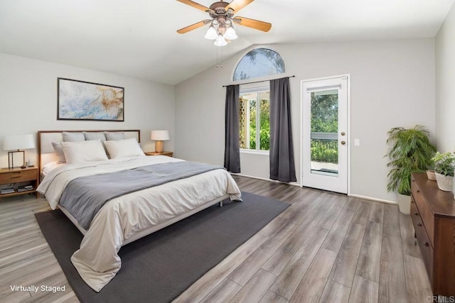 30602 Colina Verde St, Temecula, CA 92592 - bedroom featuring access to outside, vaulted ceiling, wood finished floors, and ceiling fan