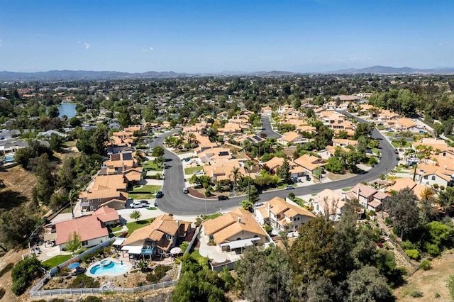 30602 Colina Verde St, Temecula, CA 92592 - aerial view of property and surrounding area with mountains, a pool area, and nearby suburban area