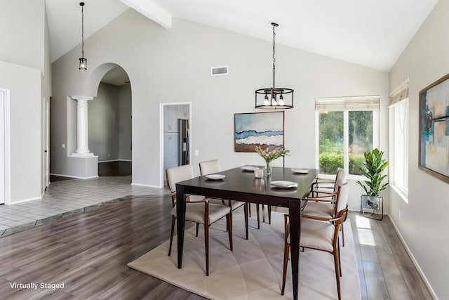 30602 Colina Verde St, Temecula, CA 92592 - dining area featuring high vaulted ceiling, wood finished floors, arched walkways, beam ceiling, and baseboards