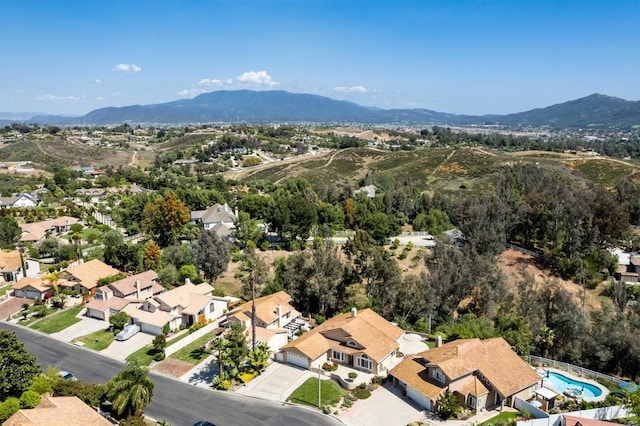 30602 Colina Verde St, Temecula, CA 92592 - aerial view of property's location with a mountain backdrop and nearby suburban area
