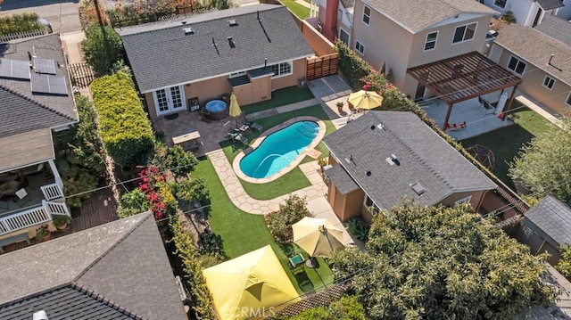 aerial perspective of suburban area with a pool