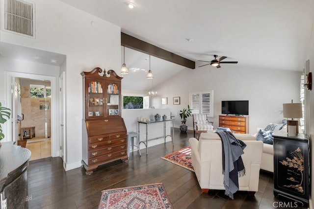living area with a ceiling fan, dark wood-style floors, a chandelier, and baseboards
