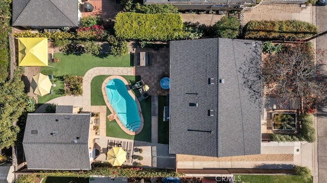 drone / aerial view of a pool area