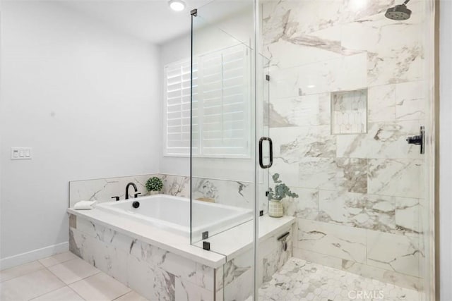 1772 Lundy Ln, Beaumont, CA 92223 - full bathroom featuring a garden tub, a marble finish shower, tile patterned floors, and baseboards