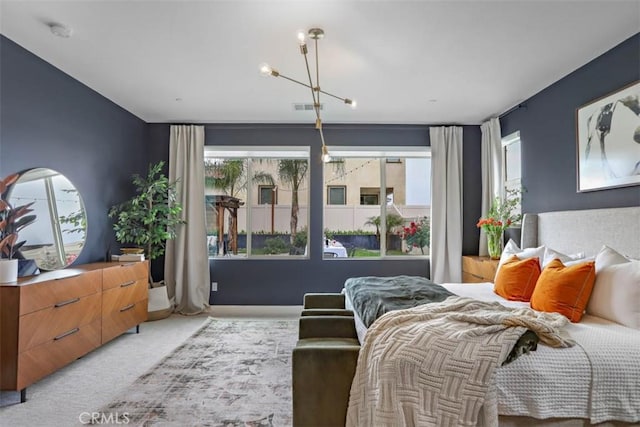 1772 Lundy Ln, Beaumont, CA 92223 - bedroom featuring carpet flooring, multiple windows, and a chandelier