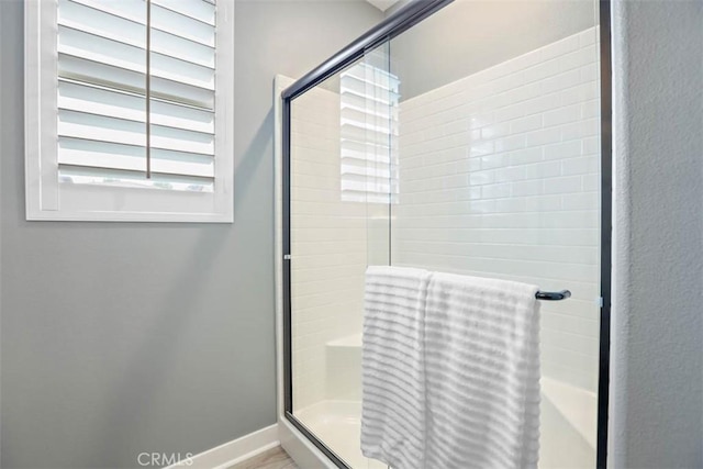 1772 Lundy Ln, Beaumont, CA 92223 - bathroom with a shower stall and baseboards