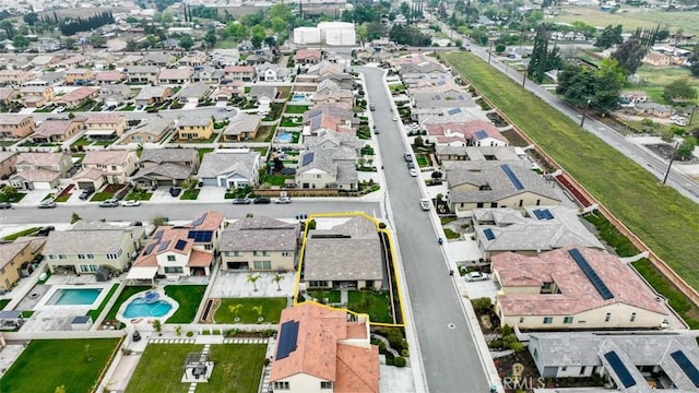 1772 Lundy Ln, Beaumont, CA 92223 - aerial view of residential area with a pool area and property parcel outlined