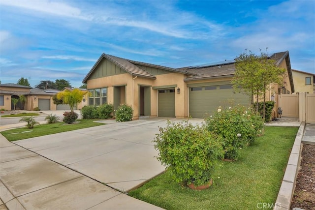 1772 Lundy Ln, Beaumont, CA 92223 - ranch-style house with driveway, roof mounted solar panels, an attached garage, and stucco siding