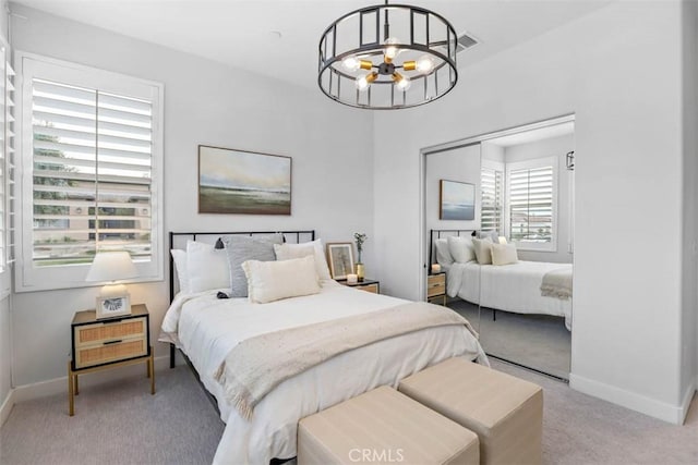 1772 Lundy Ln, Beaumont, CA 92223 - bedroom with carpet flooring, a chandelier, baseboards, and a closet