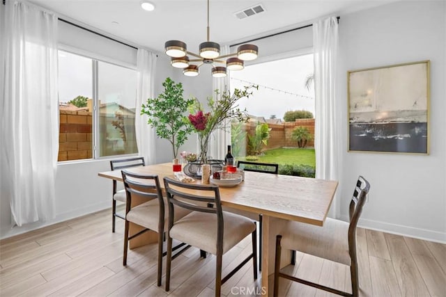 1772 Lundy Ln, Beaumont, CA 92223 - dining space with plenty of natural light, a chandelier, light wood-type flooring, recessed lighting, and baseboards