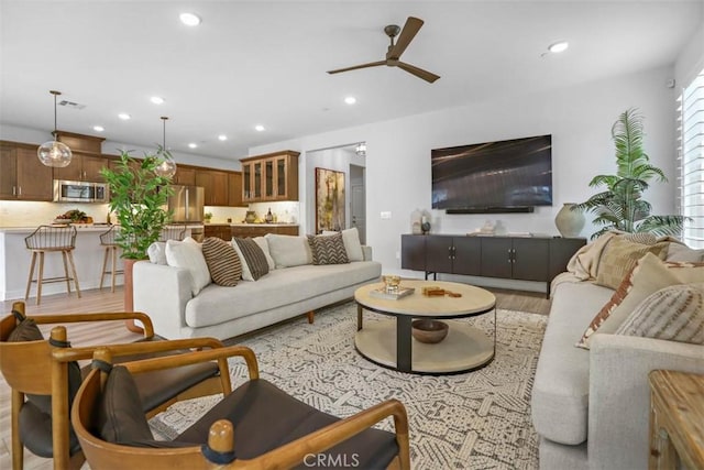 1772 Lundy Ln, Beaumont, CA 92223 - living area featuring ceiling fan, light wood finished floors, and recessed lighting