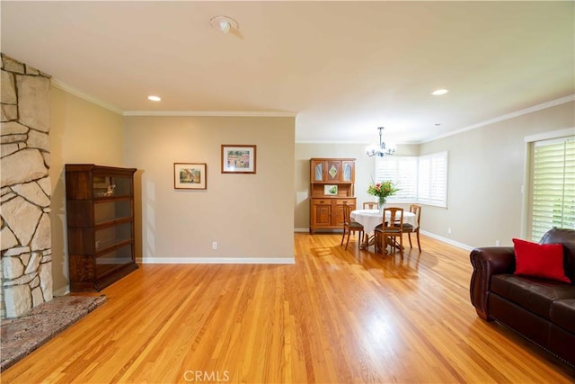 15142 Tuba St, San Fernando, CA 91345 - living room with a chandelier, light wood-style floors, ornamental molding, and recessed lighting