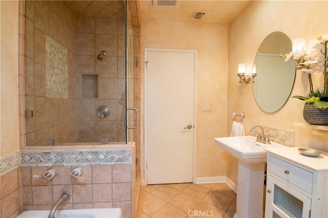 15142 Tuba St, San Fernando, CA 91345 - full bathroom featuring a bath, tile patterned floors, and a stall shower