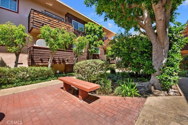 view of community with a patio