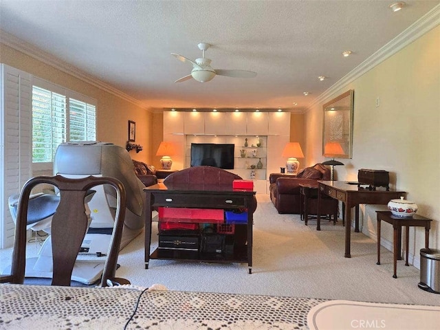 living area featuring carpet, crown molding, ceiling fan, and a textured ceiling