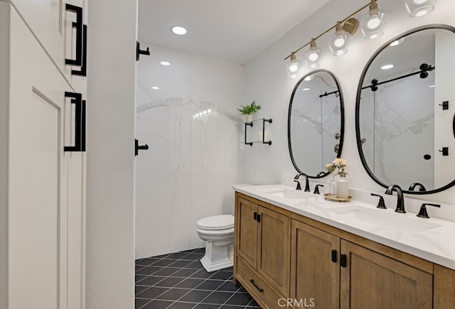 bathroom with tile patterned floors, toilet, a marble finish shower, and double vanity