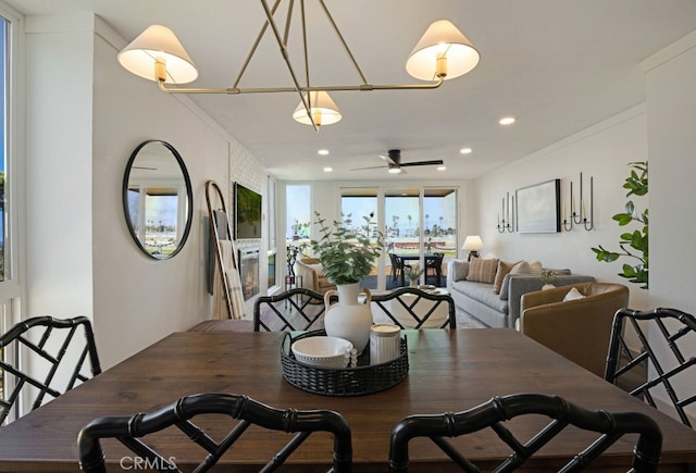 dining area with a ceiling fan and recessed lighting
