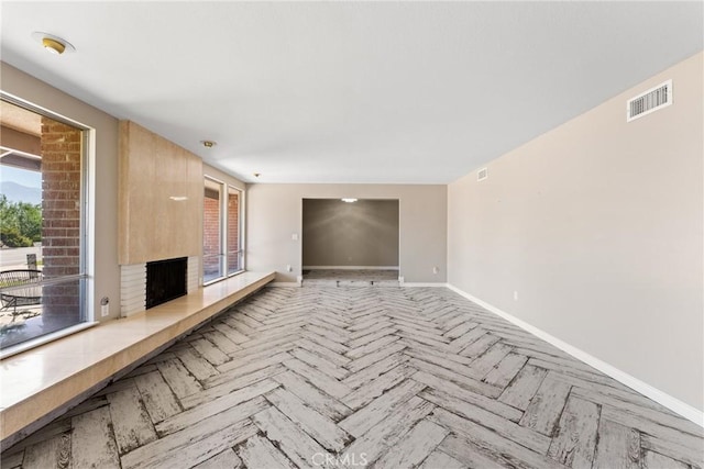 618 E Sunset Dr N, Redlands, CA 92373 - spare room featuring a fireplace and a smoke detector