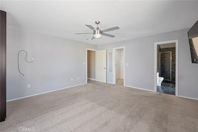 618 E Sunset Dr N, Redlands, CA 92373 - unfurnished bedroom featuring carpet floors, ensuite bathroom, and ceiling fan