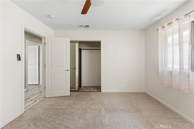 618 E Sunset Dr N, Redlands, CA 92373 - unfurnished bedroom featuring carpet, a closet, and ceiling fan