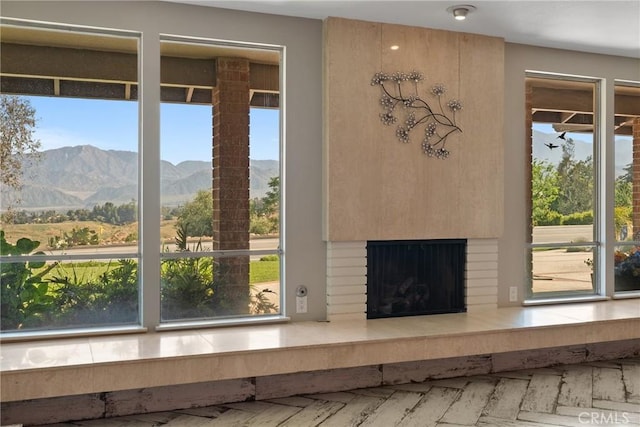 618 E Sunset Dr N, Redlands, CA 92373 - detailed view of a mountain backdrop and an outdoor brick fireplace
