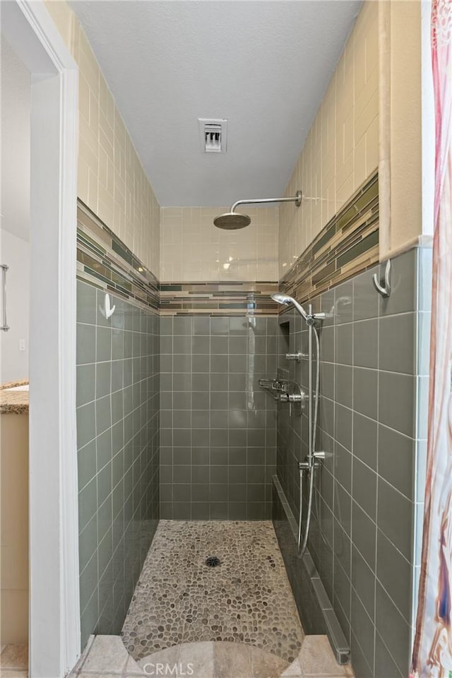 618 E Sunset Dr N, Redlands, CA 92373 - full bathroom featuring tiled shower