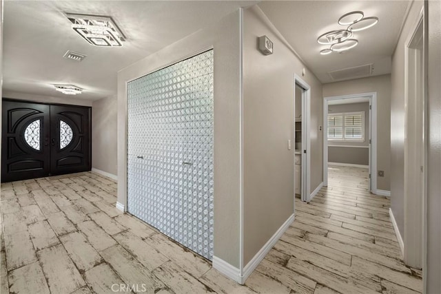618 E Sunset Dr N, Redlands, CA 92373 - entryway with french doors and wood finished floors