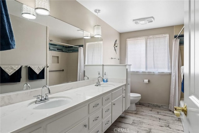 618 E Sunset Dr N, Redlands, CA 92373 - full bath featuring double vanity and wood finished floors