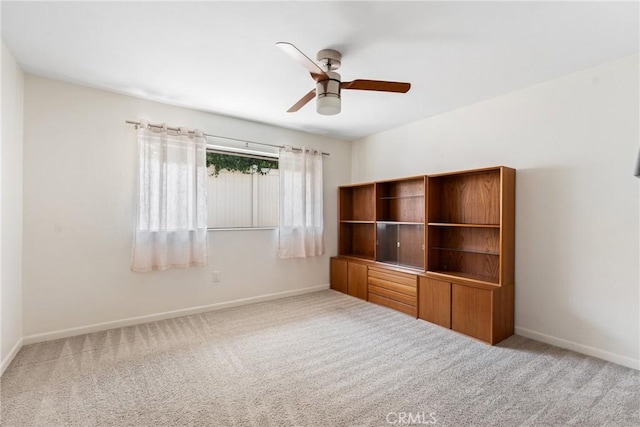 618 E Sunset Dr N, Redlands, CA 92373 - unfurnished bedroom with carpet flooring and ceiling fan
