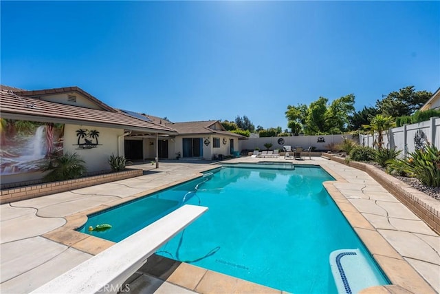 618 E Sunset Dr N, Redlands, CA 92373 - view of pool featuring a patio, a fenced backyard, and a diving board