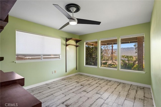 618 E Sunset Dr N, Redlands, CA 92373 - empty room with wood finished floors and ceiling fan