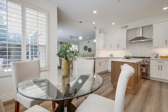2115 Via Viejo, San Clemente, CA 92673 - dining area featuring light wood finished floors and recessed lighting