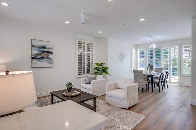 2115 Via Viejo, San Clemente, CA 92673 - living area featuring recessed lighting, light wood-type flooring, baseboards, and a chandelier