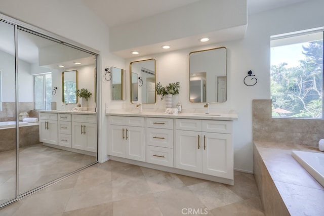 2115 Via Viejo, San Clemente, CA 92673 - bathroom featuring plenty of natural light, a garden tub, double vanity, and recessed lighting