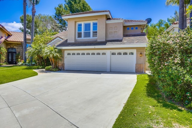2115 Via Viejo, San Clemente, CA 92673 - view of front of home featuring stucco siding, a garage, driveway, a tiled roof, and a front yard
