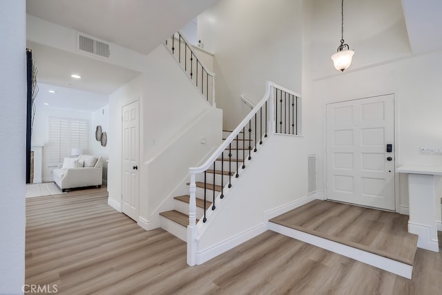 2115 Via Viejo, San Clemente, CA 92673 - entryway featuring wood finished floors, stairway, and recessed lighting