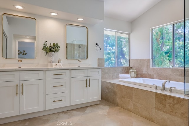 2115 Via Viejo, San Clemente, CA 92673 - bathroom with a garden tub, double vanity, a shower, recessed lighting, and tile patterned flooring