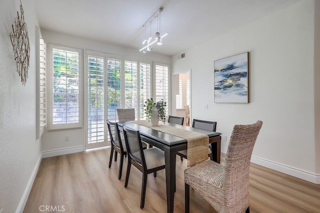2115 Via Viejo, San Clemente, CA 92673 - dining space with light wood finished floors and baseboards