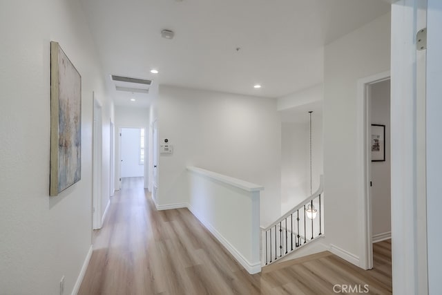 2115 Via Viejo, San Clemente, CA 92673 - hallway featuring an upstairs landing, light wood finished floors, baseboards, and recessed lighting