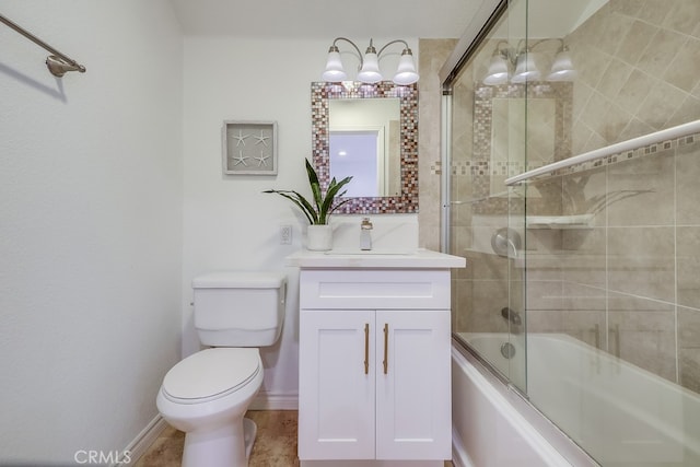 2115 Via Viejo, San Clemente, CA 92673 - bathroom featuring vanity, toilet, shower / bath combination with glass door, and baseboards
