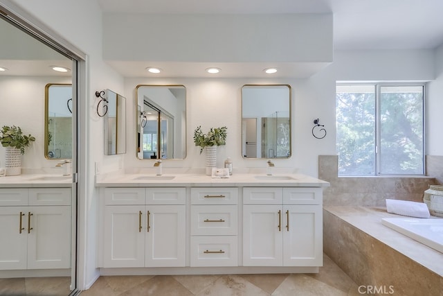 2115 Via Viejo, San Clemente, CA 92673 - bathroom featuring double vanity, a tub, and recessed lighting