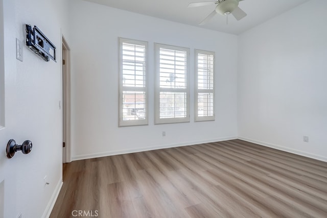 2115 Via Viejo, San Clemente, CA 92673 - unfurnished room featuring wood finished floors, a ceiling fan, and baseboards