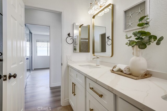 2115 Via Viejo, San Clemente, CA 92673 - bathroom with vanity and wood finished floors