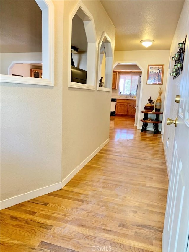 18427 Deer Hl, Hidden Valley Lake, CA 95467 - hall featuring light wood-style floors and a textured ceiling